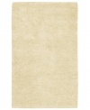 Step into ultimate softness with this opulent area rug, hand-woven with sumptuous New Zealand felted wool. In a cool ivory tone, this lush piece fits both traditional and contemporary decor.