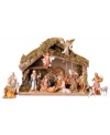 Capturing the sheer simplicity and raw beauty of baby Jesus' birth, this rustic stable, with golden grassy roof, creates the perfect setting for all of the witnesses-from shepherd to king-to gather around. Muted hues and meticulous attention to detail make this an eye-catching addition.