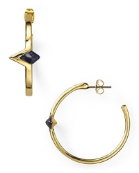 For the boho babe: this pair of House of Harlow 1960 hoops earrings flaunts geometric allure, accented by triangular stations. For the boho babe: this pair of House of Harlow 1960 hoops earrings flaunts geometric allure, accented by triangular stations.