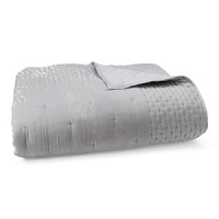 A plush, tufted silver velvet coverlet adds a dose of pure luxury to the Ornamental Scroll collection. A plush, tufted silver velvet coverlet adds a dose of pure luxury to the Ornamental Scroll collection.