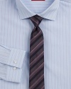 A dress classic in fine cotton, woven with berry and white pinstripes for a sharp finish. Buttonfront Spread collar Cotton Dry clean Imported 