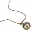 Get from A to B in a breeze. Fossil's vintage-inspired compass pendant features a chic long chain. Crafted in brass and silver tone mixed metal. Approximate length: 28 inches + 2-inch extender. Approximate drop: 1-1/2 inches.