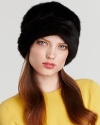 Make a chic statement in a faux mink snowball hat from Surrell.
