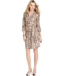 The skirt suit, updated. Nine West's modern take features a chic animal print, belted jacket and pretty pleating at the skirt. The skirt suit, updated. Nine West's modern take features a chic animal print, belted jacket and pretty pleating at the skirt.