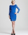 Make an impact upon entry and exit in this lacy Madison Marcus dress, cut with an alluring, deep v back.
