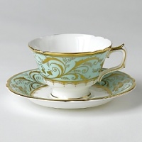 Darley Abbey captures the regency style of restrained simplicity using delicate lines and intricate curves representing twirling foliate and filigree leaves. The carefully placed ornamental elements combined with the gold glistening against the soft green Darley Abbey captures the regency style of restrained simplicity using delicate lines and intricate curves representing twirling foliate and filigree leaves. The carefully placed ornamental elements combined with the gold glistening against the soft green