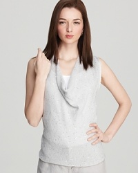 A slinky cowlneck lends elegance to this sleek Eileen Fisher tank for a look that is pure polish. Play up the neckline with over-sized chandelier earrings. A slinky cowlneck lends elegance to this sleek Eileen Fisher tank for a look that is pure polish. Play up the neckline with over-sized chandelier earrings.