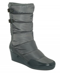Wrap up tight and keep your cool. The Pamelia boots by Calvin Klein beat the cold with a double clasp closure and puffy nylon construction. Patent trim and covered wedge sweeten the deal. Wrap up tight and keep your cool. The Pamelia boots by Calvin Klein beat the cold with a double clasp closure and puffy nylon construction. Patent trim and covered wedge sweeten the deal.