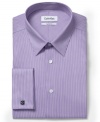 Stripes give you solid style and confidence for any high-pressure day with this sharp dress shirt from Calvin Klein.