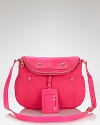 MARC BY MARC JACOBS perfects playful, preppy style with this nylon crossbody bag.