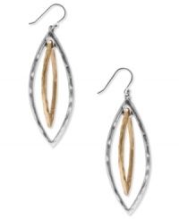 A two tone design creates a versatile look with these Lucky Brand oblong hoop earrings. Crafted in silver and gold tone mixed metal. Approximate drop: 2-1/4 inches. A two tone design creates a versatile look with these Lucky Brand oblong hoop earrings. Crafted in silver and gold tone mixed metal. Approximate drop: 2-1/4 inches.