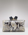 Metallic finished leather meets elegant crystals on this Overture Judith Leiber clutch, which is finished by a geometric bow ornament.