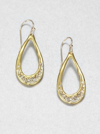 From the Miss Havisham Collection. Open teardrops of polished goldtone have subtle freeform shaping and not-so-subtle sparkle from Swarovski crystal accents.CrystalGoldtoneLength, about 1.75Width, about .5Ear wireMade in USA