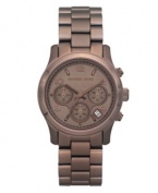 Dazzle from the dark side with this bronze Runway watch by Michael Kors.