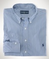 Cut for a classic, relaxed fit, a handsome striped sport shirt rendered in crisp woven cotton exudes timeless style.