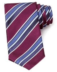Not your average stripe design, this lavish silk tie is intricately detailed with deft variations on a classic width. Not your average stripe design, this lavish silk tie is intricately detailed with deft variations on a classic width.