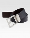 An essential, reversible design fit for any look with a brushed silvertone buckle. About 1¼ wide Imported