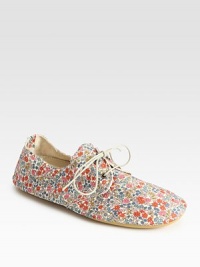 Stretchy canvas go-to in a darling floral print with a lace-up front and rubber sole. Printed cotton canvas upperRubber solePadded insoleMade in ItalyOUR FIT MODEL RECOMMENDS ordering true whole size; ½ sizes should order the next whole size up. Stretchy canvas go-to in a darling floral print with a lace-up front and rubber sole. Printed cotton canvas upperRubber solePadded insoleMade in ItalyOUR FIT MODEL RECOMMENDS ordering true whole size; ½ sizes should order the next whole size up.