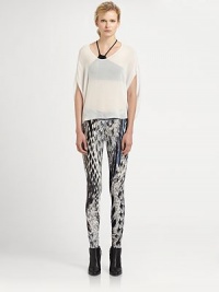 Amp up your look with this semi-sheer layering piece, enlivened by kimono sleeves and a cropped front hem. RoundneckDropped shouldersKimono sleevesCropped front hemViscoseDry cleanMade in USA of Italian fabricModel shown is 5'11 (178cm) wearing US size Small. Amp up your look with this semi-sheer layering piece, enlivened by kimono sleeves and a cropped front hem. RoundneckDropped shouldersKimono sleevesCropped front hemViscoseDry cleanMade in USA of Italian fabricModel shown is 5'11 (178cm) wearing US size Small.