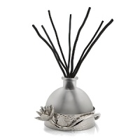 This captivating diffuser by Michael Aram features notes of green tea, bergamot, orange and Moroccan mint. The floral fragrance is intoxicating and aromatic. This captivating diffuser by Michael Aram features notes of green tea, bergamot, orange and Moroccan mint. The floral fragrance is intoxicating and aromatic.