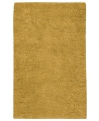 Nothing creates a warmer welcome than a rich, felted wool rug in a soothing golden hue. This luxurious piece features an undeniably soft hand, created with the finest hand-woven New Zealand wool. Nothing creates a warmer welcome than a rich, felted wool rug in a soothing golden hue. This luxurious piece features an undeniably soft hand, created with the finest hand-woven New Zealand wool.