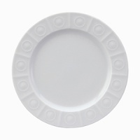 Modern in design with a raised circular pattern, made from French Limoges Porcelain. Dishwasher and microwave safe. Modern in design with a raised circular pattern, made from French Limoges Porcelain. Dishwasher and microwave safe.