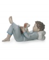 Lladro tells the charming tale of a boy and his dog with this artfully glazed porcelain figurine. Sweet for a child's bedroom.