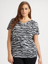 A bold print enlivens this feminine cowlneck top. Pair it with solid-colored pants or a pencil skirt.CowlneckShort sleevesAllover printPull-on styleAbout 25 from shoulder to hemPolyester/spandexMachine washImported A bold print enlivens this feminine cowlneck top. Pair it with solid-colored pants or a pencil skirt.CowlneckShort sleevesAllover printPull-on styleAbout 25 from shoulder to hemPolyester/spandexMachine washImported