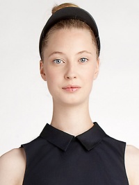 A sculptural visor-inspired piece, rendered in supple Italian leather.LeatherDry cleanMade in Italy A sculptural visor-inspired piece, rendered in supple Italian leather.LeatherDry cleanMade in Italy