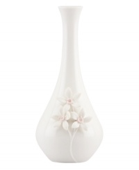 Sculpted forget-me-knots pop with a tinge of pink against this glossy white Flora bud vase. A quiet beauty in graceful Lenox porcelain. Sculpted forget-me-knots pop with a tinge of pink against this glossy white Flora bud vase. A quiet beauty in graceful Lenox porcelain.