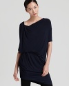 With a wide cowl neckline, this easy Donna Karan New York tunic is your new go-to, draped for a flattering fit and perfect for errand-going with soft leggings.
