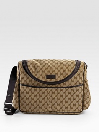 A luxe, stylish accessory for storing baby essentials in allover signature GG fabric with supple leather trim. Shoulder strap, 19½ drop Zipper closure Five outside pockets Changing mat included Inside open pocket Fully lined 17W X 12H X 5D Made in Italy A luxe, stylish accessory for storing baby essentials in allover signature GG fabric with supple leather trim. Shoulder strap, 19½ drop Zipper closure Five outside pockets Changing mat included Inside open pocket Fully lined 17W X 12H X 5D Made in Italy