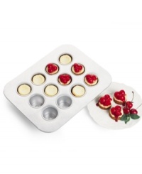 Amaze friends and wow guests with mini cheesecakes and personal cakes cooked to perfection in a 12-slot nonstick pan featuring pop-up bottoms that guarantee effortless removal of treats and impeccable presentation. 10-year warranty. Amaze friends and wow guests with mini cheesecakes and personal cakes cooked to perfection in a 12-slot nonstick pan featuring pop-up bottoms that guarantee effortless removal of treats and impeccable presentation. 10-year warranty.