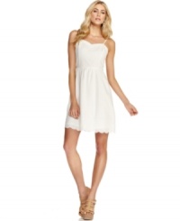Sprinkled in swiss dots and bordered in eyelets, this Kensie dress epitomizes fresh, superiorly femme style. Sprinkled in swiss dots and bordered in eyelets, this Kensie dress epitomizes fresh, superiorly femme style.