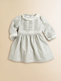 A soft brushed twill sets the foundation for this charming girly dress with pretty-in-pink floral stitching, ruched detailing and lace trim.Lace-trimmed crewneckLong sleeves with lace-trimmed single-button gathered cuffsWaistband with lace trimPetticoatWool/NylonMachine washImported Please note: Number of buttons may vary depending on size ordered. A soft brushed twill sets the foundation for this charming girly dress with pretty-in-pink floral stitching, ruched detailing and lace trim.Lace-trimmed crewneckLong sleeves with lace-trimmed single-button gathered cuffsWaistband with lace trimPetticoatWool/NylonMachine washImported Please note: Number of buttons may vary depending on size ordered.