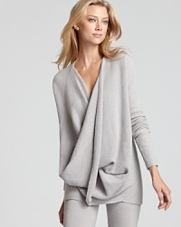 Update your layering collection with this cool Donna Karan New York cashmere sweater boasting a low cowl neckline with crossover detail. Slip it on with leggings or jeans and work the weekend in style. Update your layering collection with this cool Donna Karan New York cashmere sweater boasting a low cowl neckline with crossover detail. Slip it on with leggings or jeans and work the weekend in style.