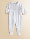 This angelic one-piece is crafted in plush pima cotton and embellished with eye-catching smocking and scalloping for sweet baby style.Peter Pan collarLong sleevesBack snapsBottom snapsPima cottonMachine washImported Please note: Number of snaps may vary depending on size ordered. 