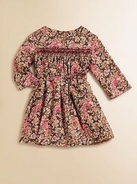 Blooming with brilliant flowers, this sweet cotton frock features a smocked bodice and and cinched waist with ribbon tie.Round necklineLong sleevesBack buttonsSmocked, gathered bodiceWaistband with ribbon tieFull, gathered skirtCottonMachine washImported Please note: Number of buttons may vary depending on size ordered. Blooming with brilliant flowers, this sweet cotton frock features a smocked bodice and and cinched waist with ribbon tie.Round necklineLong sleevesBack buttonsSmocked, gathered bodiceWaistband with ribbon tieFull, gathered skirtCottonMachine washImported Please note: Number of buttons may vary depending on size ordered.
