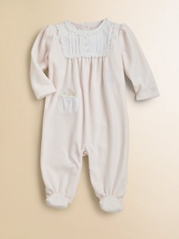 A beautiful long-sleeved footed coverall in plush velour is highlighted with a pretty pintucked bib.CrewneckLong puff sleevesBack buttonsFront patch pocketBottom snapsCottonMachine washImported Please note: Number of buttons/snaps may vary depending on size ordered. 