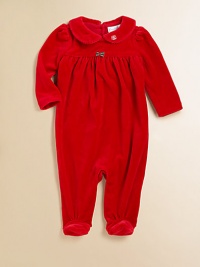 A beautiful long-sleeved footed coverall in plush velour is highlighted with pretty puffed sleeves and an empire waist.Peter Pan collarLong sleevesBack buttonsGathered empire waistBottom snaps80% cotton/20% polyesterMachine washImported Please note: Number of buttons may vary depending on size ordered. A beautiful long-sleeved footed coverall in plush velour is highlighted with pretty puffed sleeves and an empire waist.Peter Pan collarLong sleevesBack buttonsGathered empire waistBottom snaps80% cotton/20% polyesterMachine washImported Please note: Number of buttons may vary depending on size ordered.