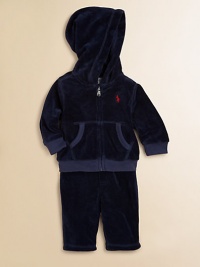 This coordinating athletic set includes a classic full-zip hoodie and a matching sweatpant in soft, cozy velour. Hoodie Attached hoodLong sleevesFull-zip frontSplit kangaroo pocketRibbed cuffs and hem Sweatpants Elasticized waist with tieMock fly87% cotton/13% polyesterMachine washImported This coordinating athletic set includes a classic full-zip hoodie and a matching sweatpant in soft, cozy velour. Hoodie Attached hoodLong sleevesFull-zip frontSplit kangaroo pocketRibbed cuffs and hem Sweatpants Elasticized waist with tieMock fly87% cotton/13% polyesterMachine washImported