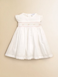 This design featuring beautiful rosebuds and elegant pleating is the perfect dress for your little one. Round necklineRuffled cap sleevesRosebuds with scalloped trimBack button closurePima cottonMachine washImported This design featuring beautiful rosebuds and elegant pleating is the perfect dress for your little one. Round necklineRuffled cap sleevesRosebuds with scalloped trimBack button closurePima cottonMachine washImported