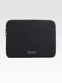Protect your laptop in style with this lightly padded neoprene case finished with debossed logo detail and a signature patch.Zip closureNeoprene15¼W x 11½H x 1DImported Protect your laptop in style with this lightly padded neoprene case finished with debossed logo detail and a signature patch.Zip closureNeoprene15¼W x 11½H x 1DImported