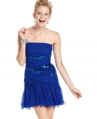 A ruffled hem and subtle dose of sequins add charm to this strapless party dress from Roberta! A ruffled hem and subtle dose of sequins add charm to this strapless party dress from Roberta!