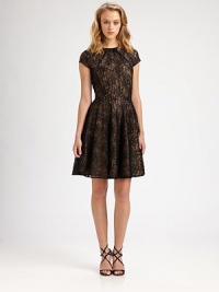 Delicate lace gives this feminine, full-skirted silhouette a romantic appeal.Gathered jewel necklineCap sleevesBack keyhole with button closureConcealed back zipFully linedAbout 26 from natural waistNylon/metallicDry cleanMade in USAModel shown is 5'10 (177cm) wearing US size 4. Delicate lace gives this feminine, full-skirted silhouette a romantic appeal.Gathered jewel necklineCap sleevesBack keyhole with button closureConcealed back zipFully linedAbout 26 from natural waistNylon/metallicDry cleanMade in USAModel shown is 5'10 (177cm) wearing US size 4.