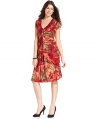 Add a bright splash of color to your wardrobe with Cha Cha Vente's printed V-neck dress. Add a bright splash of color to your wardrobe with Cha Cha Vente's printed V-neck dress.