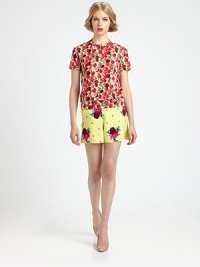 Contrast stitching and a vibrant floral print dress up this knit pullover.Crewneck with stitched V detailShort sleevesBanded hemlineViscose/cottonDry cleanMade in USA of imported fabricModel shown is 5'10 (177cm) wearing US size Small. Contrast stitching and a vibrant floral print dress up this knit pullover.Crewneck with stitched V detailShort sleevesBanded hemlineViscose/cottonDry cleanMade in USA of imported fabricModel shown is 5'10 (177cm) wearing US size Small.