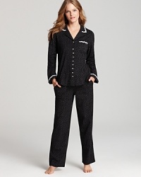 Elevate your bedroom basics with Eileen West's dotted pajama set. Floral lace trim and flower-shaped buttons lend a lovely touch. Elevate your bedroom basics with Eileen West's dotted pajama set. Floral lace trim and flower-shaped buttons lend a lovely touch.