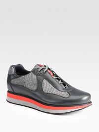 Sporty yet sophisticated, this classic sneaker is finely crafted in rich Italian leather with mesh detail.Leather/mesh upperLeather liningPadded insoleRubber soleMade in Italy Sporty yet sophisticated, this classic sneaker is finely crafted in rich Italian leather with mesh detail.Leather/mesh upperLeather liningPadded insoleRubber soleMade in Italy