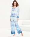 Embrace the lovely decorations of winter while staying warm and cozy in One World's Frozen Snowfall pajamas.